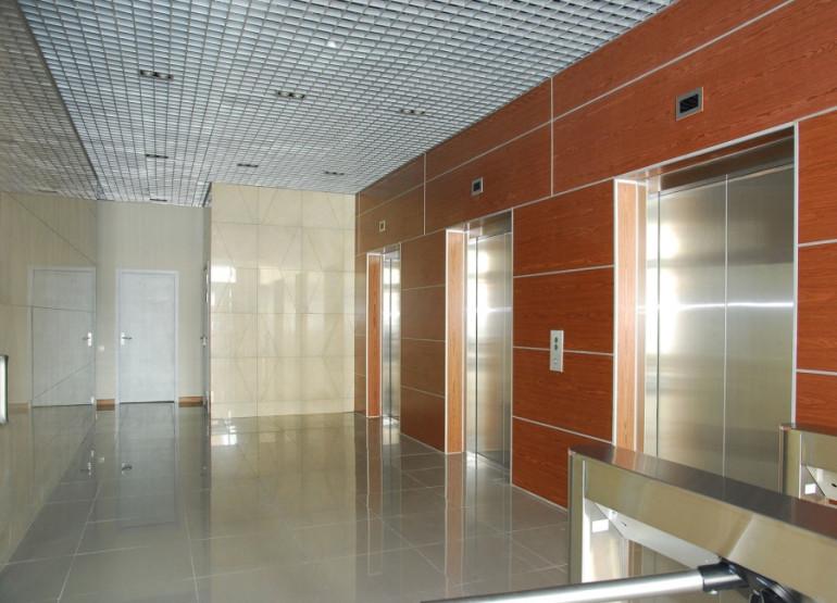 Трио: Вид главного лифтового холла